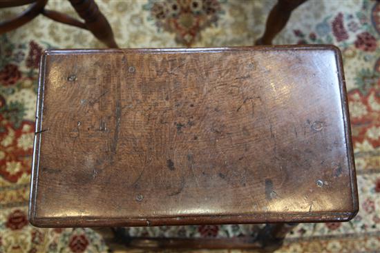 A 17th century oak joynt stool, incised with the initials W. R. 1ft. 7in. H.1ft 9in.